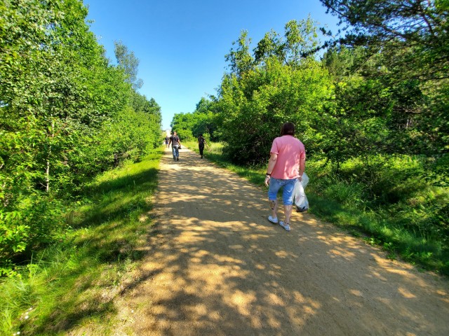 Members of the Fort McCoy Sgt. Audie Murphy Club Chapter, their family members, and others from Fort McCoy, Wis., participate in a one-hour cleanup effort July 16, 2020, along the Elroy-Sparta Bike Trail in Sparta, Wis. More than 30 people...