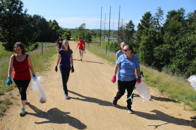 Members of the Fort McCoy Sgt. Audie Murphy Club Chapter, their family members, and others from Fort McCoy, Wis., participate in a one-hour cleanup effort July 16, 2020, along the Elroy-Sparta Bike Trail in Sparta, Wis. More than 30 people...