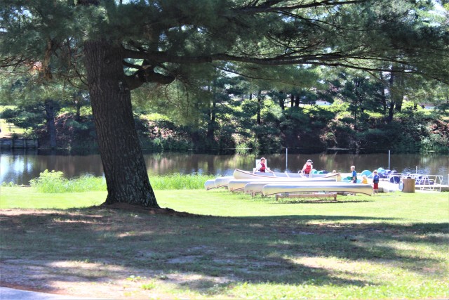 A scene of a family preparing to use a canoe at Suukjak Sep Lake at Pine View Campground in the Pine View Recreation Area is shown June 25, 2020, at Fort McCoy, Wis. The recreation area includes acres of publicly accessible land with hiking...