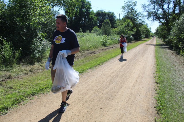 Members of the Fort McCoy Sgt. Audie Murphy Club Chapter, their family members, and others from Fort McCoy, Wis., participate in a one-hour cleanup effort July 16, 2020, along the Elroy-Sparta Bike Trail in Sparta, Wis. More than 30 people...