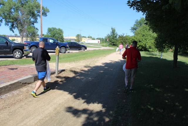 Members of the Fort McCoy Sgt. Audie Murphy Club Chapter, their family members, and others from Fort McCoy, Wis., participate in a one-hour cleanup effort July 16, 2020, along the Elroy-Sparta Bike Trail in Sparta, Wis. More than 30 people...