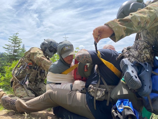 National Guard members help injured hiker after rock slide