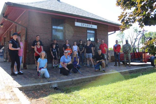 Members of the Fort McCoy Sgt. Audie Murphy Club Chapter, their family members, and others from Fort McCoy, Wis., participated in a one-hour cleanup effort July 16, 2020, along the Elroy-Sparta Bike Trail in Sparta, Wis. Here some are shown in a...