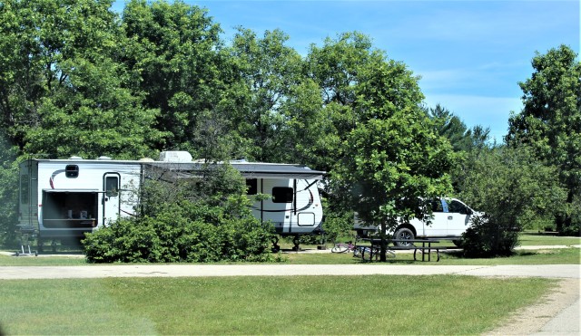 A camper is shown June 25, 2020, at Pine View Campground at Fort McCoy, Wis. Open year-round, Pine View Campground is part of Pine View Recreation Area. This area also includes Whitetail Ridge and Sportsman’s Range. The campground is nestled in...