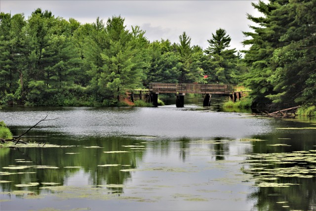 A scene of Suukjak Sep Lake at Pine View Campground in the Pine View Recreation Area is shown July 9, 2020, at Fort McCoy, Wis. The recreation area includes acres of publicly accessible land with hiking trails, Pine View Campground, Whitetail...