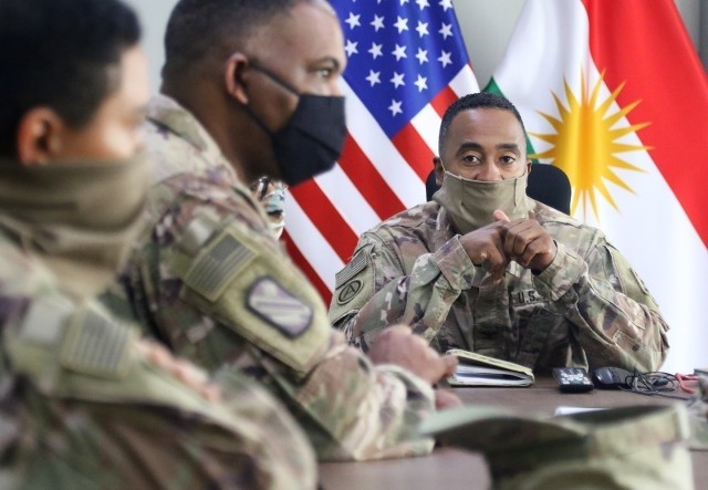 U.S. Army Col. Jerome Jackson, 207th Regional Support Group and Al Asad Base commander, listens to his troops at Erbil Air Base, Iraq, May 20, 2020. Jackson discussed current activities and answered questions during multiple meetings with the...