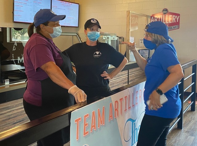 Artillery Grille cooks Iraida Mendez, left, and Crystal talk with Stacy Downing, director of the Directorate of Family, and Morale, Welfare and Recreation, July 31, about the MWR appreciation tours. (U.S. Army photo by Dionte Berry, Fort Campbell...