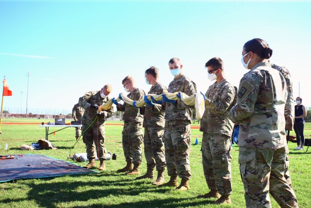 Capt. Jordan Henrickson, C/5-5th ADA commander, and volunteer Soldiers from his battery prepare to fill a helium balloon July 31, 2020, next to Lawton High School. When the air defense artillery Soldiers aren’t launching balloons, they shoot...