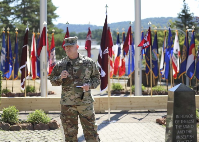 Command Sgt. Maj. Thurman Reynolds, outgoing command sergeant major, Landstuhl Regional Medical Center, addresses an audience during a Relinquishment of Responsibility ceremony, Aug. 5.
