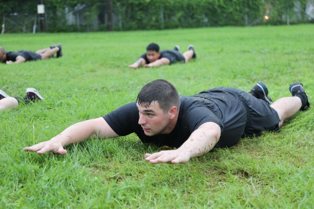Spc. Alfred Ball, a Basic Leader Course student assigned to U.S. Army Japan, conducts physical training July 17 on Camp Zama, Japan. Soldiers in Japan normally attend the monthlong course at the Eighth Army NCO Academy in Korea. However, due to travel restrictions as a result of ongoing concerns over COVID-19, the Soldiers completed the course at their own installation. (U.S. Army photo by Noriko Kudo)