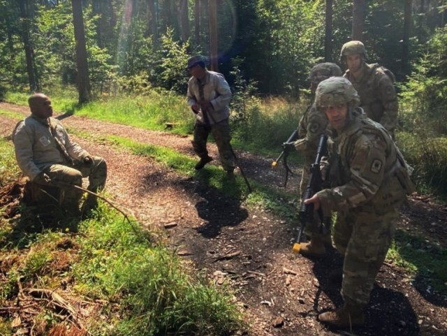 U.S. Army Reserve Soldiers from the 361st Civil Affairs Brigade, 7th Mission Support Command, conduct a tactical training patrol involving reaction to enemy and civilian contact during exercise Forward and Ready 20 at United States Army Garrison...