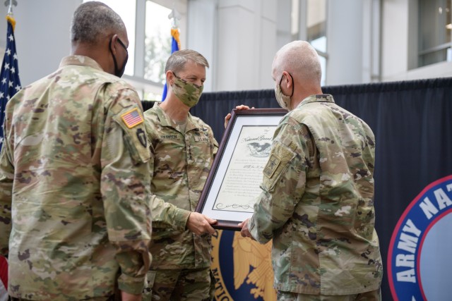 Lt. Gen. Jon A. Jensen assumes responsibility as the 22nd director of the Army National Guard on Monday at the Temple Army National Guard Readiness Center in Arlington, Va.