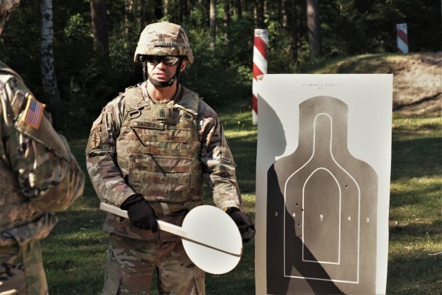 U.S. Army Reserve 1st Sgt. Domenic Barbeiro of the 773rd Civil Support Team, 7th Mission Support Command, conducts range safety operations for the M17 pistol qualification during exercise Forward and Ready 20 at United States Army Garrison Bavaria...