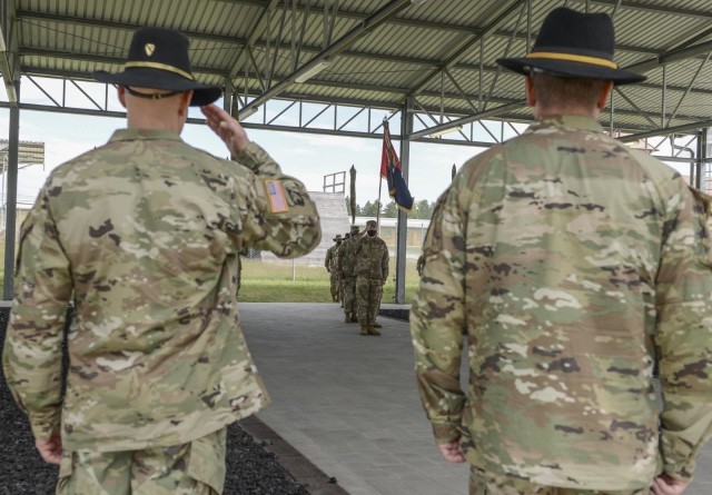 Brig. Gen. Brett Sylvia, 1st Cavalry Division Forward commander, salutes Maj. Alex Wray, the executive officer of 2nd Armored Brigade Combat Team, 1st Infantry Division to end the transfer of authority ceremony in Grafenwoehr, Germany, July 2,...
