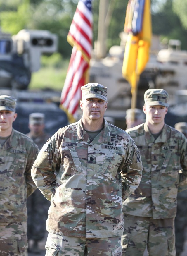 Lt. Col. Marc Austin, outgoing commander of the 2nd Battalion, 69th Armored Regiment, 2nd Armored Brigade Combat Team, 3rd Infantry Division, stands in front of his formation one last time during the battalion change of command ceremony on Camp...