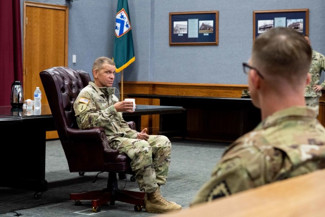 Sgt. Maj. of the Army Michael Grinston discusses the permantent change of station process with Soldiers and their spouses who recently moved to Fort Leavenworth, Kans. during his visit on Aug. 12, 2020. 