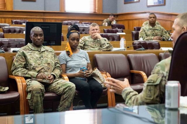 Sgt. Maj. of the Army Michael Grinston discusses the permanent change of station process with Soldiers and their spouses who recently moved to Fort Leavenworth, Kans. during his visit on Aug. 12, 2020. 