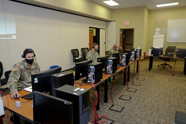 FORT BENNING, Ga. – Soldiers prepare for a computer simulation experiment inside the Modeling Simulation Branch of Fort Benning's Maneuver Battle Lab Aug. 13. Recently, the MSB's team of computer simulation experts ran a three-week...