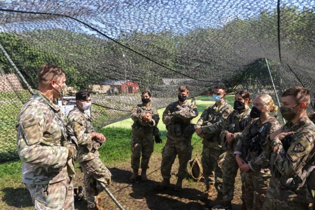 First Lt. Maylon Robertson, USMA Class of 2017, talks with Class of 2023 cadets during Cadet Field Training. Robertson, who helped run one of the call for fire lanes during the summer, was one of eight U.S. Military Academy graduates to return as part of the Cadet Summer Training task force.