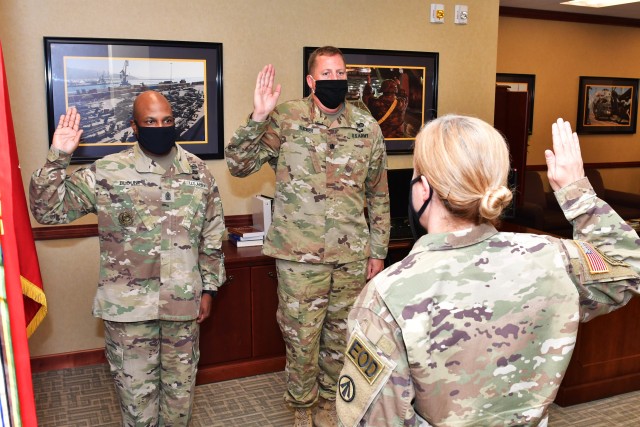 Brig Gen. Heidi J. Hoyle, Military Surface Deployment and Distribution Command commanding general, administers the Inspector General Oath to Lt. Col. Billy Tucker and Sgt. Maj. Chay Blount August 13, 2020.