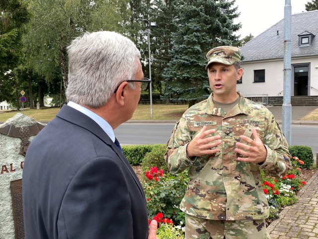 Col. Vance J. Klosinski (right) talks with Rheinland-Pfalz Minister of the Interior Roger Lewentz during a visit to Baumholder Military Community Aug. 13.