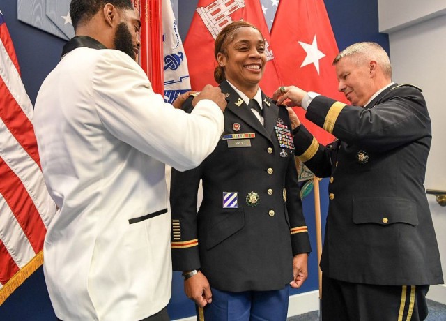 Lt. Col. Lynn Ray, center, is pinned as a colonel during her promotion ceremony April 4, 2019, by her brother Yvon Dessus, left, and Lt. Gen. Todd T. Semonite, right, commander of the U.S. Army Corps of Engineers.
