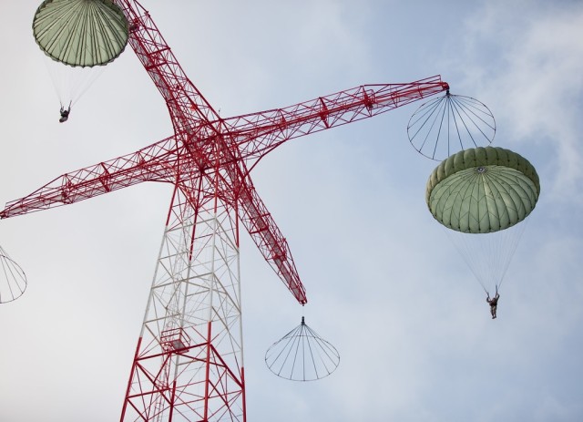 
FORT BENNING, Ga. – In an August 2013 photo, students of the U.S. Army Airborne School who hope to become paratroopers, learn to steer a parachute during descent from a 250-foot training tower here. Fort Benning is birthplace of the U.S. Army Airborne, and home to the Airborne School, which trains paratroopers for the Army and other services. President George W. Bush established National Airborne Day in 2001 to commemorate a series of test parachute jumps that were completed Aug. 16, 1940 by the U.S. Army Parachute Test Platoon, leading to formation of the Army&#39;s Airborne units that fought in World War II. It is observed every Aug. 16.
(U.S. Army photo)

