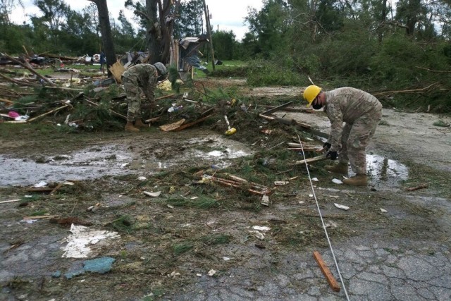 NCNG soldiers with the 105th Engineer Battalion support local first responders near Windsor, NC in the aftermath of Hurricane Isaias. A tornado destroyed a mobile home park near Windsor.