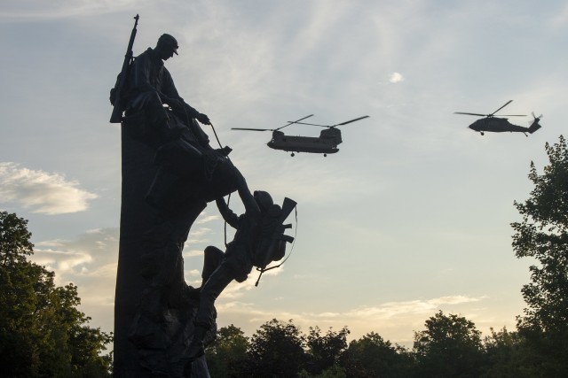 Col. Darrell Doremus, outgoing 10th Combat Aviation Brigade commander, and Chief Warrant Officer 5 Jeffrey Starritt, 10th CAB command chief warrant officer, conduct a final flight as members of the command team Aug. 14 at Fort Drum. (10th Mountain Division photo)