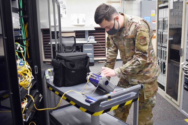 Senior Airman Dimo Rashev, assigned to 374th Communications Squadron’s Operating Location C, works in Building 771 at Camp Zama, Japan, July 24.