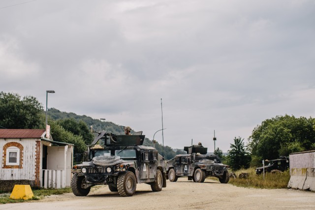 U.S Army military police soldiers assigned to the 554th MP Company, 709th MP Battalion, 18th MP Brigade maintain security in a notional city while supporting the 173rd Airborne Brigade during Exercise Saber Junction 20 in Hohenfels Training Area,...