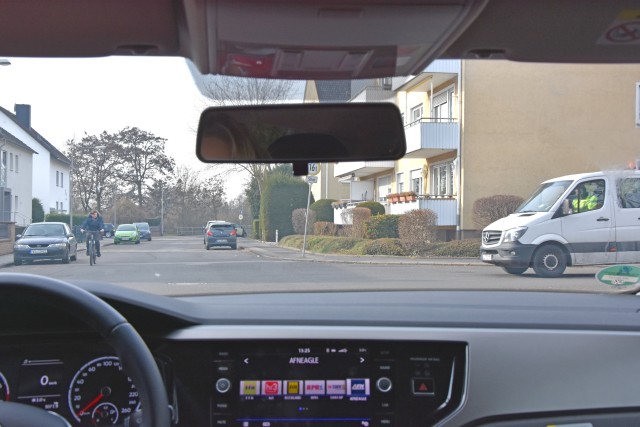 Drivers approaching an intersection with no signs should yield to vehicles coming from the right.