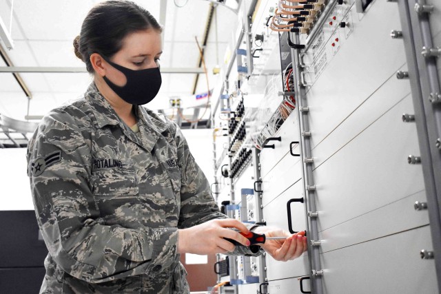Airman Megan Hotaling, assigned to 374th Communications Squadron’s Operating Location C, works in Building 771 at Camp Zama, Japan, July 24.