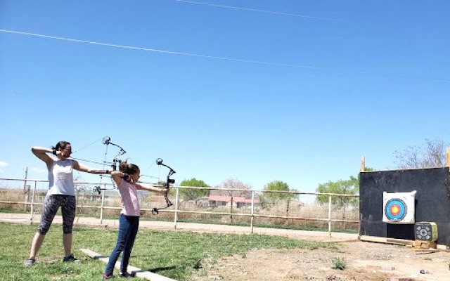 A coach and a student participant in archery class during a past Child and Youth Services clinic. Sign-ups for this year's USAG Rheinland-Pfalz DFMWR Child and Youth Services sports clinics ends Aug. 23.
(Photo by Ian Beckley)
