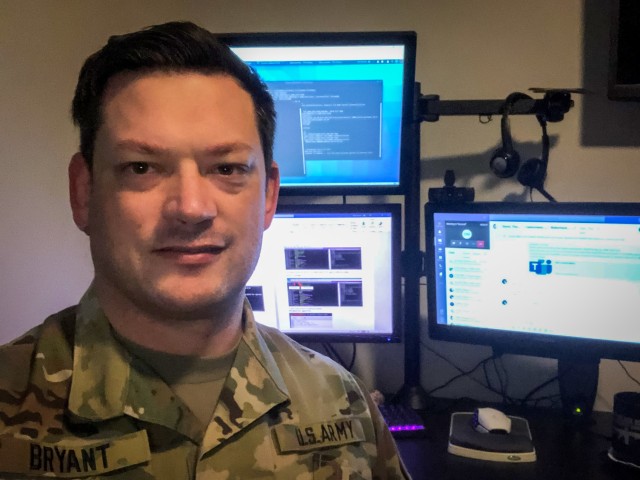 U.S. Army Reserve Lt. Col. Blake Bryant, a cyber officer with Cyber Protection Team 185 poses for a photo during his unit’s Virtual Battle Assembly Aug. 9, 2020. Bryant, an assistant professor of practice at the University of Kansas, develops cybersecurity curricula as a civilian bringing those skills to the Department of Defense. 