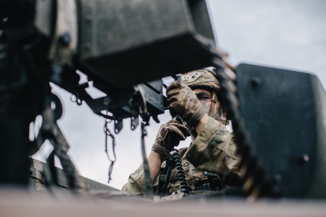 U.S Army military police soldiers assigned to the 554th MP Company, 709th MP Battalion, 18th MP Brigade provide security while supporting the 173rd Airborne Brigade during Exercise Saber Junction 20 in Hohenfels Training Area, Germany, Aug. 14,...