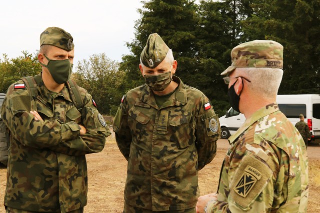 A Polish delegation, assigned to the 37th Air Defense Squadron, visits with U.S. Soldiers assigned to the 10th Army Air and Missile Defense Command on August 4, 2020 in Baumholder, Germany. The purpose of the visit was to familiarize the Polish soldiers with the patriot missile system and the Table VIII Gunnery qualification.