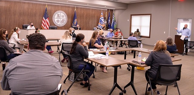 Fort Leavenworth-Unified School District 207 tabletop exercise facilitator Don Black, Fort Leavenworth Garrison emergency manager, right, discusses COVID-19-related topics with USD 207 representatives, including school nurses, secretaries,...