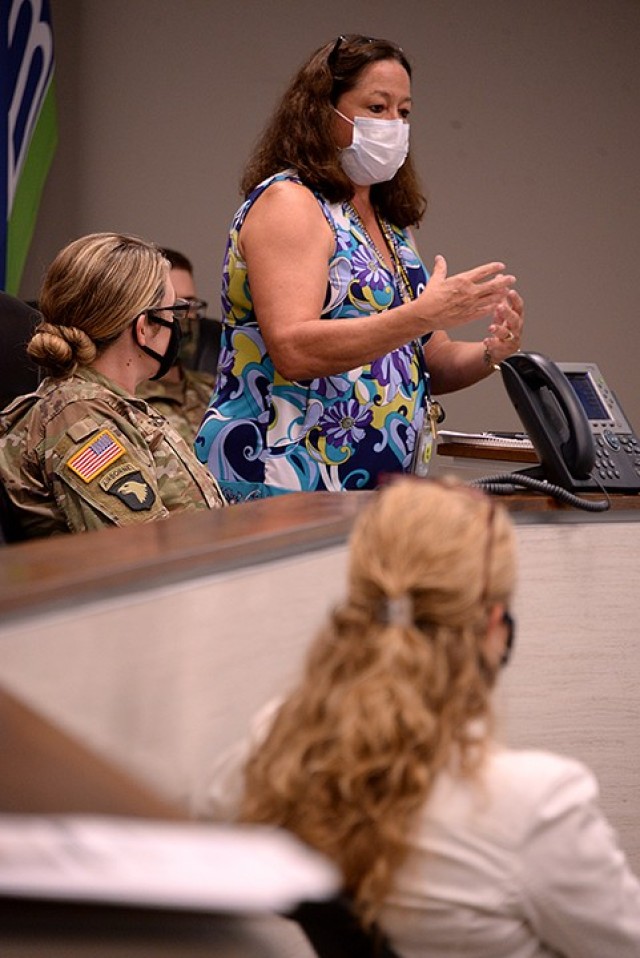 Tammy Robinett, chief of Public Health at Munson Army Health Center, explains the process of what to do when someone tests positive for COVID-19 according to Centers for Disease Control and Prevention guidelines during the Fort Leavenworth-Unified...