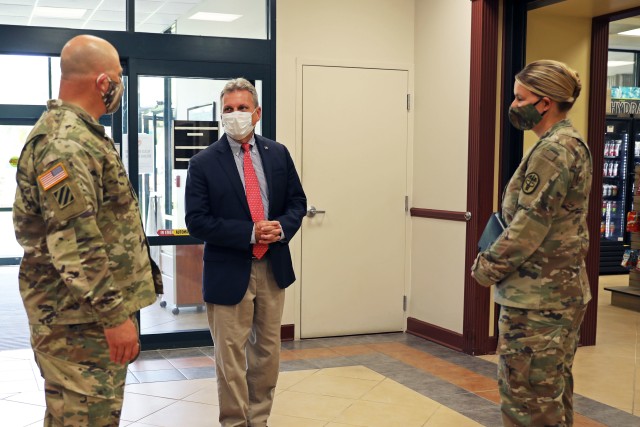 Congressman Earl L. &#34;Buddy&#34; Carter, U.S. Representative of Georgia&#39;s 1st District, introduces himself to Col. Bryan Logan, the Fort Stewart garrison commander, and Col. Julie Freeman, the Fort Stewart MEDDAC commander, at Winn Army Community Hospital, Autg. 11 on Fort Stewart. Carter met with Fort Stewart officials to discuss new COVID-19 policies and preventative measures on the installation and in the surrounding community. (U.S. Army photo by Sgt. Zoe Garbarino)