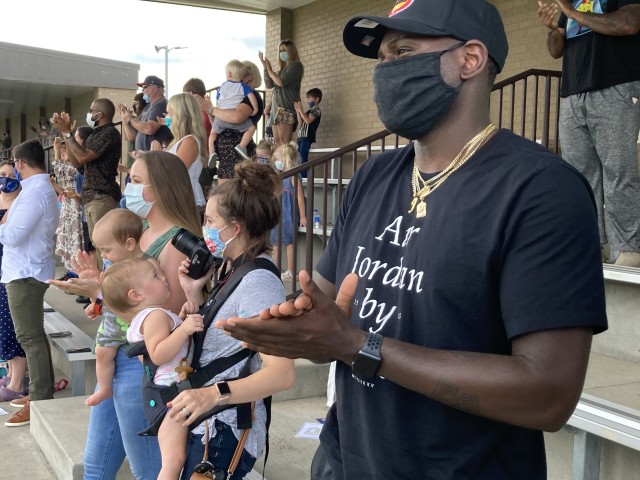 Staff Sergeant Darrius Williams, who served with 3rd Brigade Combat Team 2013-17, stands and claps, Aug. 18, during a welcome home ceremony for 1st Battalion, 187th Infantry Regiment, 3rd Brigade Combat Team, 101st Airborne Division (Air Assault)...