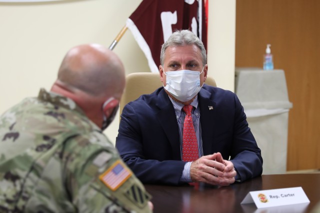 Congressman Earl L. &#34;Buddy&#34; Carter, U.S. Representative of Georgia&#39;s 1st District, speaks to Col. Bryan Logan, the Fort Stewart garrison commander, at Winn Army Community Hospital, Aug. 11 on Fort Stewart. Carter met with Fort Stewart officials to discuss new COVID-19 policies and preventative measures on the installation and in the surrounding community. (U.S. Army photo by Sgt. Zoe Garbarino)