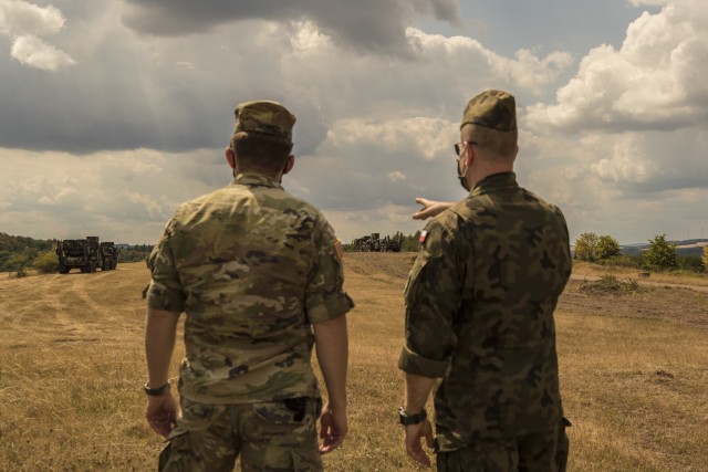 A Polish delegation, assigned to the 37th Air Defense Squadron, visits with U.S. Soldiers assigned to the 10th Army Air and Missile Defense Command on August 4, 2020 in Baumholder, Germany. The purpose of the visit was to familiarize the Polish soldiers with the patriot missile system and the Table VIII Gunnery qualification.