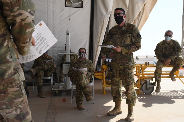 ARIFJAN, Kuwait—Capt. Jason Brandle, Task Force Spartan Shield director of the personnel recovery coordination cell, provides updated personnel recovery training to flight crews assigned to the 1st Battalion, 189th General Support Aviation...