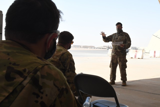 ARIFJAN, Kuwait—Capt. Jason Brandle, Task Force Spartan Shield director of the personnel recovery coordination cell, provides updated personnel recovery training to flight crews assigned to the 1st Battalion, 189th General Support Aviation...