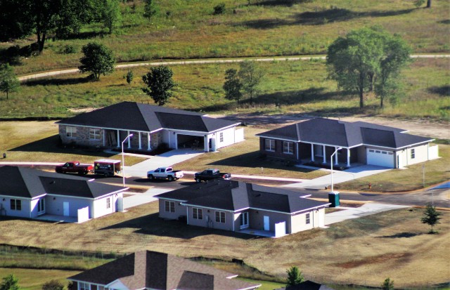 Workers with contractor Relyant Global LLC of Maryville, Tenn., continue work on a U.S. Army Corps of Engineers-led project Aug. 4, 2020, to build seven new military family housing units at the South Post Housing area in this aerial view at Fort...