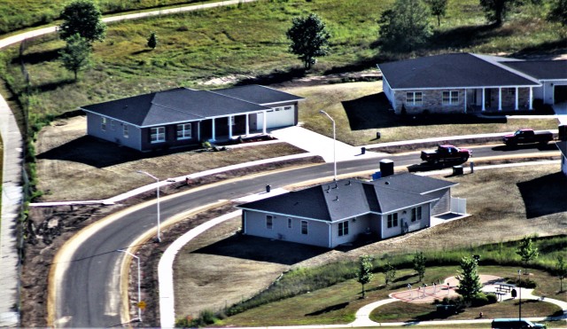 Workers with contractor Relyant Global LLC of Maryville, Tenn., continue work on a U.S. Army Corps of Engineers-led project Aug. 4, 2020, to build seven new military family housing units at the South Post Housing area in this aerial view at Fort...