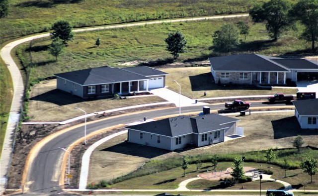 Workers with contractor Relyant Global LLC of Maryville, Tenn., continue work on a U.S. Army Corps of Engineers-led project Aug. 4, 2020, to build seven new military family housing units at the South Post Housing area in this aerial view at Fort...