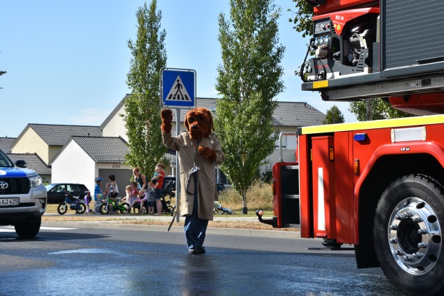 WIESBADEN, Germany – McGruff the Crime Dog waves to spectators during a First Responders Day parade Aug. 21 on Clay Kaserne.