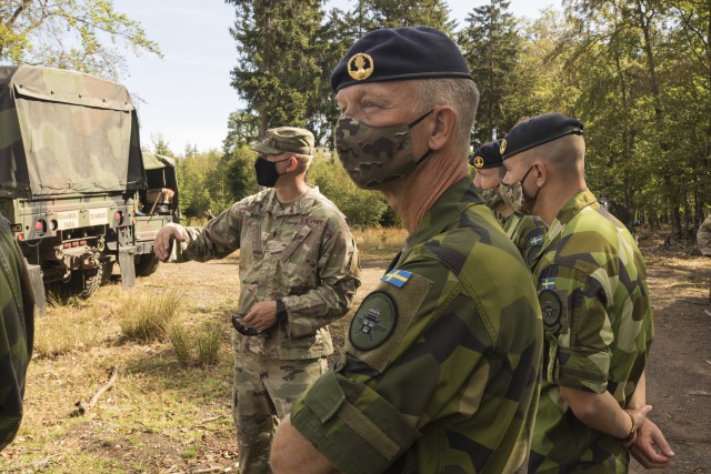 Swedish soldiers, assigned to the Air Defence Regiment, visit U.S. Soldiers assigned to the 5th Battalion, 7th Air Defense Artillery Regiment, 10th Army Air and Missile Defense Command, in Baumholder training Area, Germany on Aug. 18-20. The Swedish Armed Forces visit was to observe  training and to collaborate with the U.S. air defense artillery unit, and to discuss future training that may take place in the European theater.